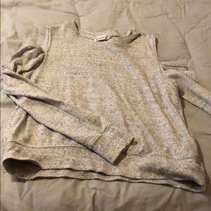 Lightly used sweater with missing shoulders